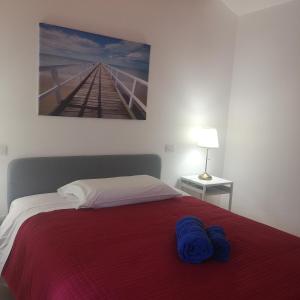 A bed or beds in a room at La Persiana2