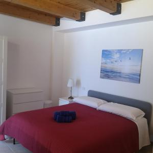 A bed or beds in a room at La Persiana2