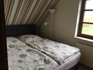Ένα ή περισσότερα κρεβάτια σε δωμάτιο στο Zwischen den Feldern
