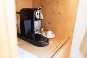 Příslušenství pro přípravu čaje a kávy v ubytování Hotel Müller - mountain lodge
