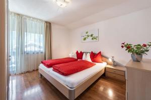 A bed or beds in a room at Sigmundhof