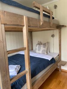 a couple of bunk beds in a room at Villa Sole, Trysil in Trysil