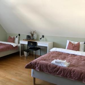 Säng eller sängar i ett rum på Villa Sole, Trysil