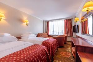 Posteľ alebo postele v izbe v ubytovaní Hotel Gołębiewski Białystok