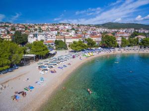 an aerial view of a beach with people in the water at House Haus Marijo in Crikvenica