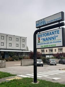 a sign for a hotel in front of a parking lot at Ristorante Hotel Turandot Magnolia!!! in Grisignano di Zocco