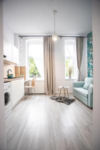 Kuchyňa alebo kuchynka v ubytovaní Apartamenty Centrum