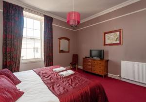 Cama ou camas em um quarto em Bank St Royal Mile
