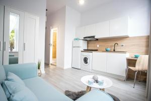 Kuchyňa alebo kuchynka v ubytovaní Apartamenty Centrum