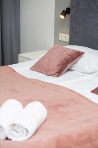 Posteľ alebo postele v izbe v ubytovaní Sławińska Apartment Warsaw Wola by Noclegi Renters