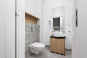 Kúpeľňa v ubytovaní Sławińska Apartment Warsaw Wola by Noclegi Renters
