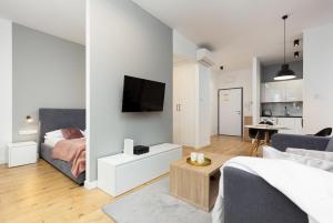 Kuchyňa alebo kuchynka v ubytovaní Sławińska Apartment Warsaw Wola by Noclegi Renters