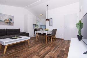 Posezení v ubytování Apartments Lumini