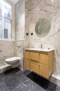 Kylpyhuone majoituspaikassa CMG-Champs Elysées - Boetie 8