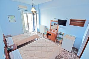 Postel nebo postele na pokoji v ubytování Hotel Blue Sea