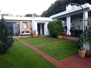 Vonkajšia záhrada v ubytovaní Apartments Villa Holiday