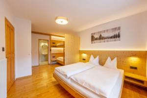 Letto o letti in una camera di Hotel Garni Angerer