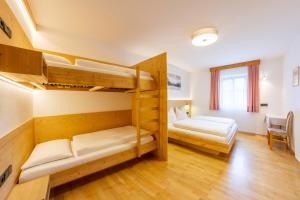 Letto o letti in una camera di Hotel Garni Angerer