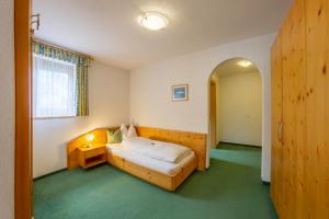 Letto o letti in una camera di Hotel Garni Angerer