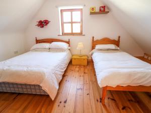 Postel nebo postele na pokoji v ubytování Crolly Home