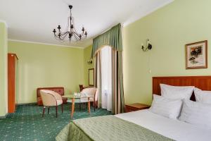 
Кровать или кровати в номере Гостиница Коломенское
