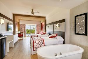 Postel nebo postele na pokoji v ubytování Riu Palace Costa Mujeres - All Inclusive