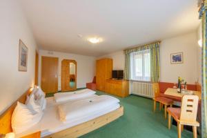 Letto o letti in una camera di Hotel Garni Angerer