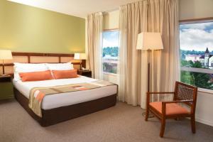 Postel nebo postele na pokoji v ubytování Solace Hotel Puerto Varas