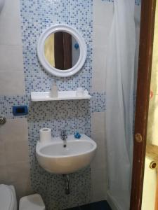 Uma casa de banho em B&B PompeiLog