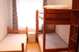 Posteľ alebo postele v izbe v ubytovaní Apartman 825