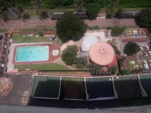 an overhead view of a swimming pool with a resort at 197 Stella Maris in Amanzimtoti