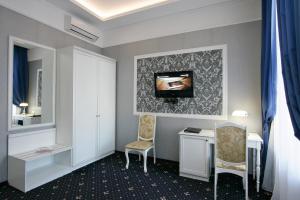 TV a/nebo společenská místnost v ubytování Hotel Litera