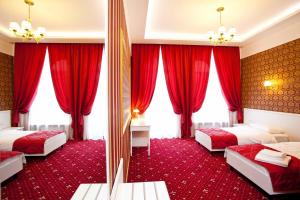 Postel nebo postele na pokoji v ubytování Hotel Litera