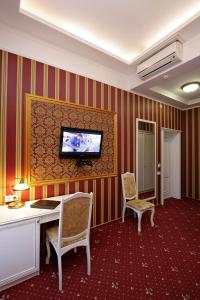 TV a/nebo společenská místnost v ubytování Hotel Litera