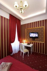 Postel nebo postele na pokoji v ubytování Hotel Litera