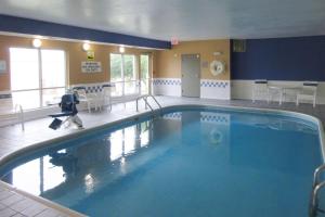 a large swimming pool in a hotel room at Clarion Inn near Wright Patterson - Dayton in Fairborn