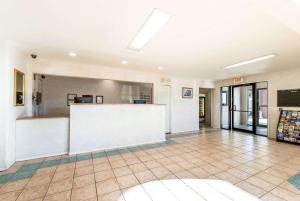 a lobby with a counter in a building at Rodeway Inn Decatur in Decatur