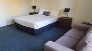 Postel nebo postele na pokoji v ubytování Hotel Cavalier