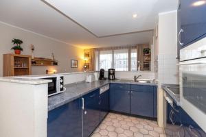 Кухня или кухненски бокс в Haus-Mecklenburg-FeWo-Senta-Wohnung-11-920