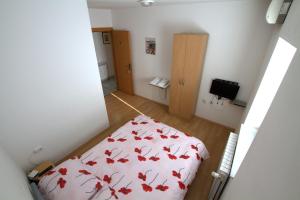 Posteľ alebo postele v izbe v ubytovaní Guest House Ivac Inn Zagreb Airport + 28 fotografií