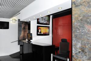 TV a/nebo společenská místnost v ubytování Hotel Joao XXI