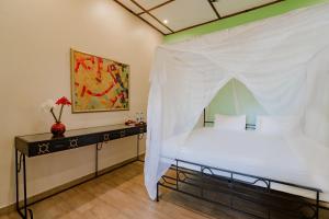 Un ou plusieurs lits dans un hébergement de l'établissement Mediterraneo Boutique Hotel