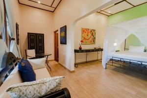 Un ou plusieurs lits dans un hébergement de l'établissement Mediterraneo Boutique Hotel