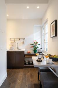 Kuchyň nebo kuchyňský kout v ubytování Novella Goldoni Suite-by Florence Concierge