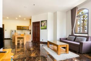 Kuchyň nebo kuchyňský kout v ubytování Kim Minh Apartment & Hotel