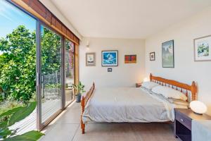 Ένα ή περισσότερα κρεβάτια σε δωμάτιο στο Nelson Eco Home