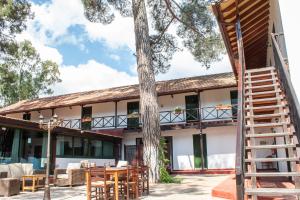 a view of the inn from the patio at New Okella Hotel at Saittas in Saittas