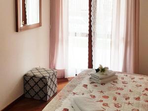 Postel nebo postele na pokoji v ubytování In Vacanza da Miki 03