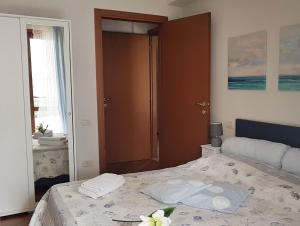 Postel nebo postele na pokoji v ubytování In Vacanza da Miki 03