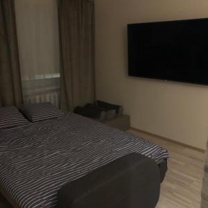 Postel nebo postele na pokoji v ubytování Narva mnt 23’’